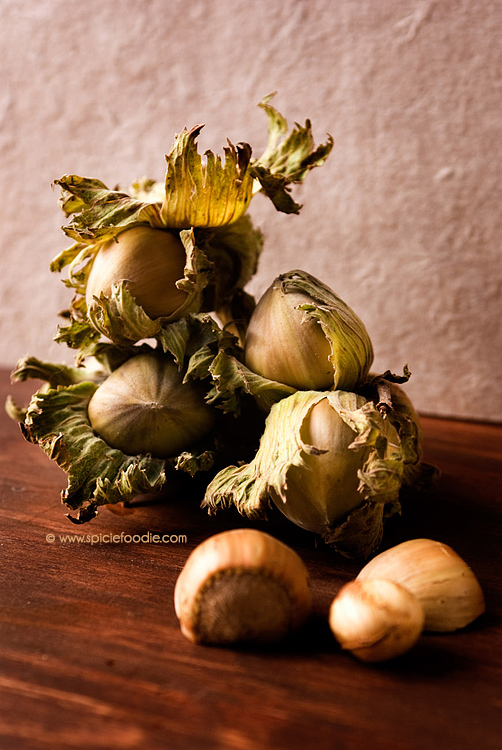 How do you roast walnuts in their shells?