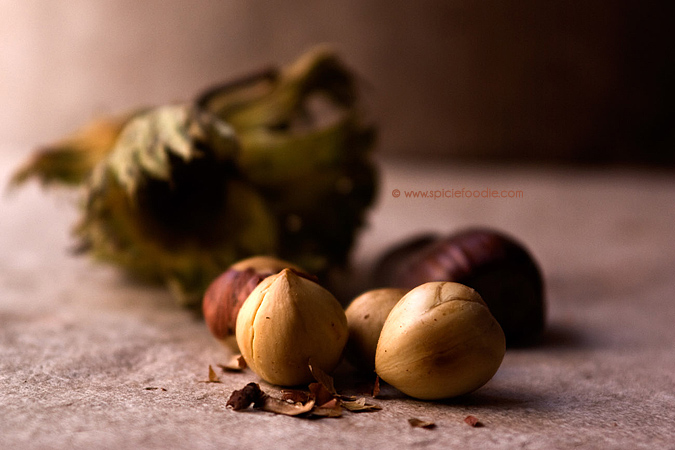 How do you roast walnuts in their shells?